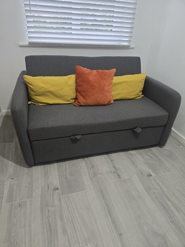 Two seater sofabed great - in,